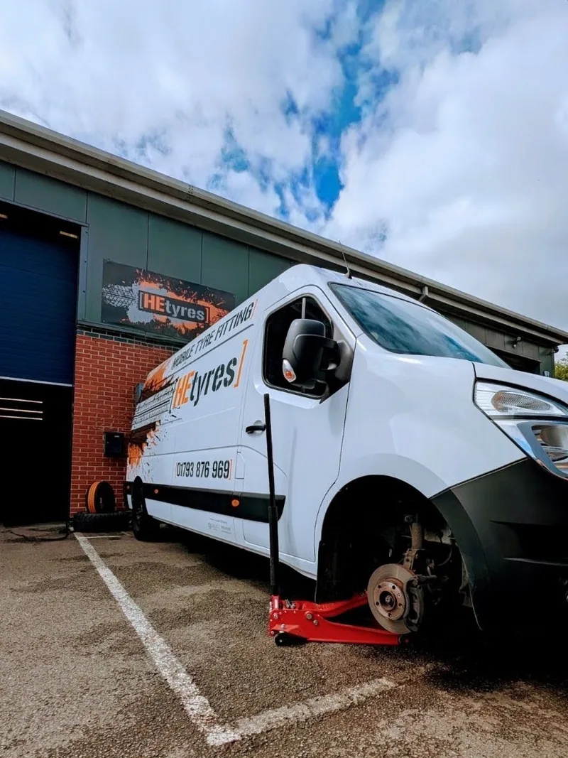 HEtyres van on site for a mobile puncture repair, wheel off and jacked up
